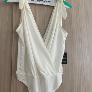 Beautiful cream tank bodysuit